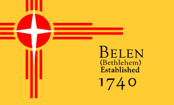 The Belen City flag a red Zia symbol with a white star of Bethlehem on top are on the top left. The words Belen (Bethlehem) Established 1740 are written on the bottom right hand side.
